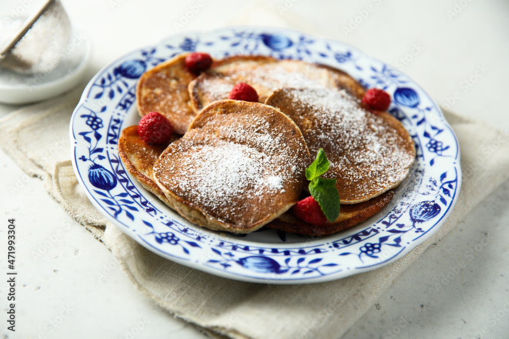 Wall mural traditional homemade pancakes with raspberry