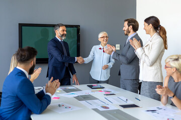 Happy success business people working, brainstoming together in office on meeting