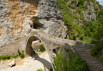 Fototapeta na wymiar Daytime view of Kokkori Bridge in the national of Vikos-Aoos in northern Greece