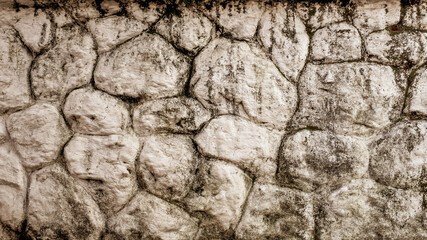 Old grungy retro dirty dusty brick wall of built fortress city. Cracked vintage pitted peeled surface worn facade cellar. Ruined shabby grimy holes blocks. Crumbled ragged pathway for 3D grunge design