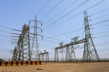 A high-voltage power line masts in Riyadh Province, Saudi Arabia