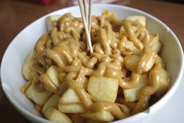 Fried potatoes on a bowl