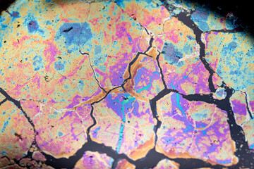 Multicolored gasoline film on tea