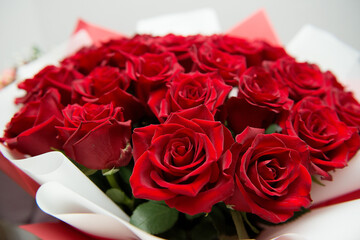 Bouquet of bright red roses, close-up.