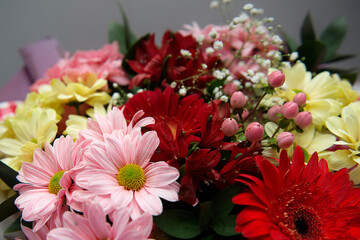 A bouquet of white and red chrysanthemums, close-up.