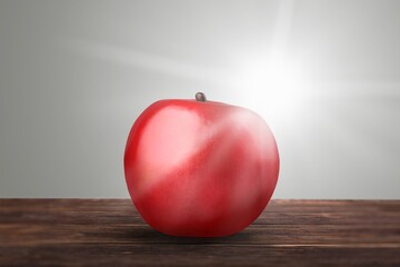 Fresh sweet ripe apple on the desk