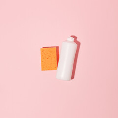 Chemical poisoned cleaning supplies bottles isolated on pink pastel background. Hard shadow, trendy shot, copy space for your adds, cleaning service flyer, coupon, banner