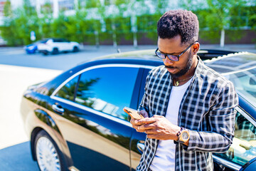 brazilian handsome man useing smartphone app to drive a new travel road