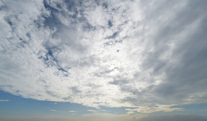 Sunset sky. Abstract nature background. Dramatic blue with orange colorful clouds in twilight time.