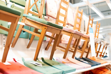 Wooden chairs on the display of a furniture store