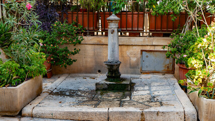 Old public aqueduct fountain