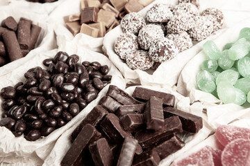 Assortment of delicious chocolate candies background. Chocolate candy isolated 