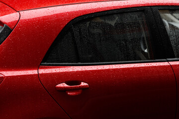 Red car door handle - Powered by Adobe