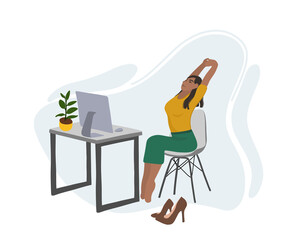 Workout at the table or desk. Woman practicing workout at workplace. 
Office worker and doing exercises. A young African American woman  doing exercises and warming up near a table with a computer. 