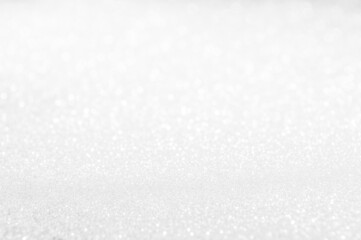 Abstract of Bright and sparkling bokeh background. silver and diamond dust bokeh blurred lighting from glitter texture