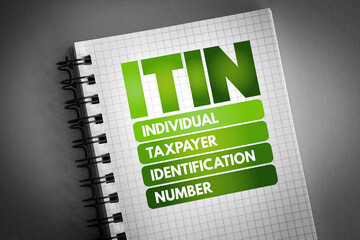 ITIN - Individual Taxpayer Identification Number acronym on notepad, concept background
