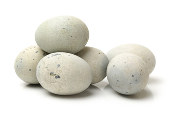 preserved duck eggs on white background