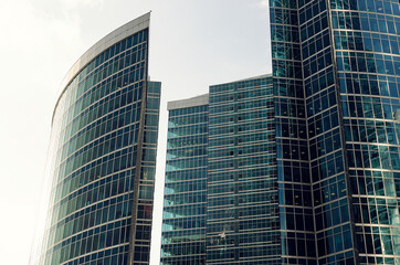 Obraz premium RUSSIA, MOSCOW: Bottom up scenic cityscape view of industrial glass skyscrapers 