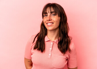 Young Argentinian woman isolated on pink background happy, smiling and cheerful. - obrazy, fototapety, plakaty