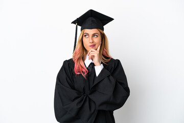 Young university graduate over isolated white background having doubts and thinking