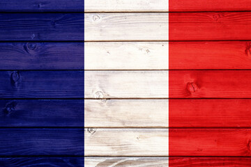 Flag of France on wooden surface