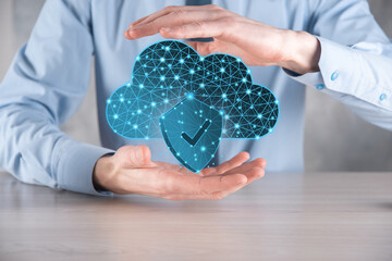 Cloud technology. Polygonal wireframe cloud storage sign with shield with a tick on dark blue....