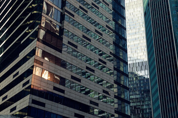 Fototapeta premium RUSSIA, MOSCOW: Bottom up scenic cityscape view of industrial glass skyscrapers 
