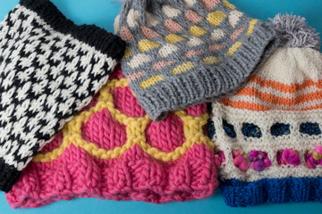 Fototapeta na wymiar hand knitted wool hats and cowl