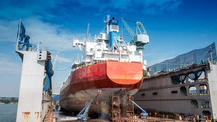 The hull painting consists of washing, blasting and painting of the vessel cargo ship by operator...
