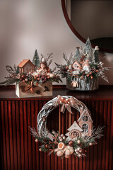 Christmas decorations on furniture, round decorative wreath,