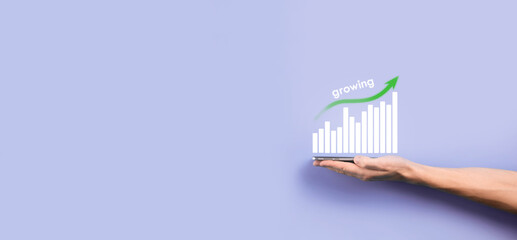 Male hand holding smart mobile phone with graph icon.checking analyzing sales data growth graph chart and stock market on global networking. Business strategy, planning and digital marketing