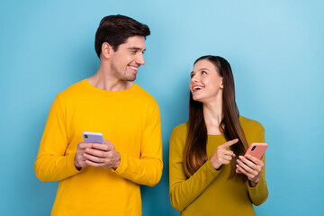 Photo of millennial buddies lady show guy social network feedback like isolated over blue color background