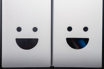 White paper folders with cheerful emotions and a smile