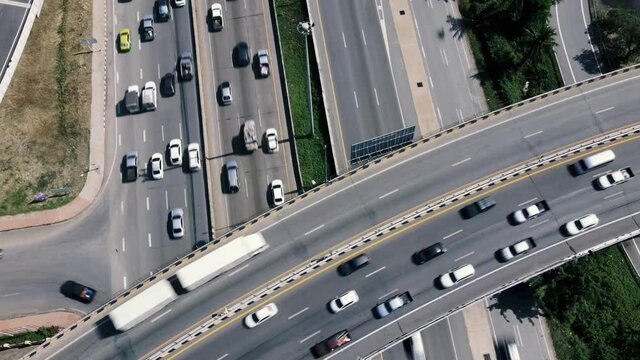 top view hyper lapse of highways and traffic of multiple cars