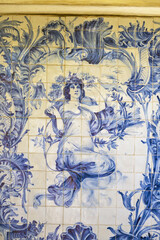 Fototapeta na wymiar Azulejos panels in the gardens of a palace in Estoi, Algarve, Portugal 