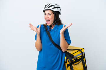 Young delivery woman with thermal backpack isolated on white background with surprise facial expression
