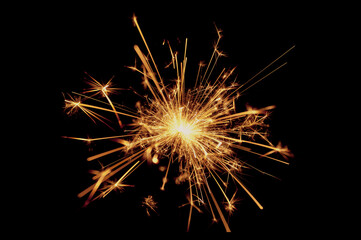 Burning sparklers isolated on black background