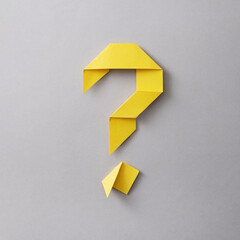 Fototapeta Origami question mark of neatly folded yellow paper obraz
