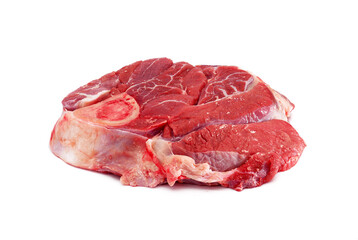 Raw steak with bone. Slice of beef isolated on white background.