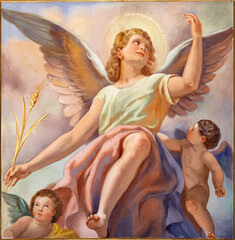 FORLÍ, ITALY - NOVEMBER 11, 2021: The fresco of angel with the spike in the Cattedrala di Santa Croce after renaissance painter Melozzo da Forlí by Giovanni Secchi (1876 - 1950).