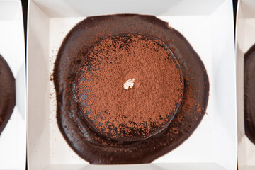 Molten chocolate lava cake with dark chocolate sauce