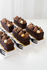 Hazelnut dark chocolate layer stick, delicacy dessert