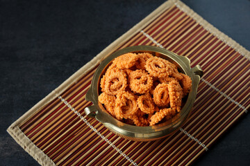 Rice murukku savoury Arisi murukku chakli chakali Pongal festival snack deep fried coconut oil traditional South Indian chennai Tamil Nadu India Kerala Sri Lanka, Onam, Vishu, Diwali Makar Sankranti