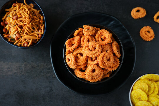 Rice murukku savoury Arisi murukku chakli chakali Pongal festival snack deep fried coconut oil traditional South Indian chennai Tamil Nadu India Kerala Sri Lanka, Onam, Vishu, Diwali Makar Sankranti