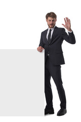 Business man in suit with banner