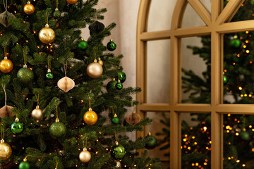 New year background. Christmas tree and Christmas lights and decorations. Soft selective focus.