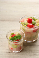 Sop Buah or Es Buah is Mixed Fruit with Coconut or Simple Syrup, Served with Shaved Ice and add Condensed Milk to Add Creamy Swetened