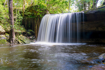 Fototapeta na wymiar Waterfall at Phu Kradueng national park, Loei Thailand, beautiful landscape of waterfalls in rainforest