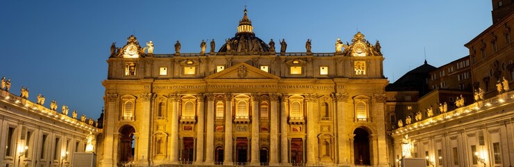 Panorama in Piazza San Pietro, or Saint Peters Square, during the blue hour with a view of the basilica in Vatican City.