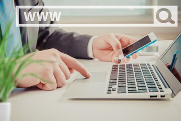 Human hand holding phone showing security code for reset password